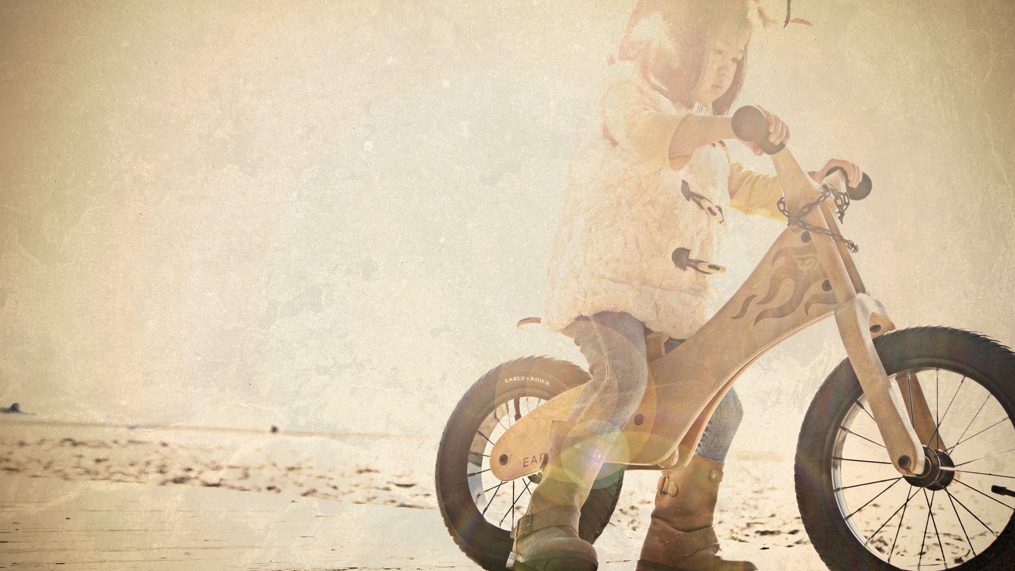 Kid riding a Classic balance bike